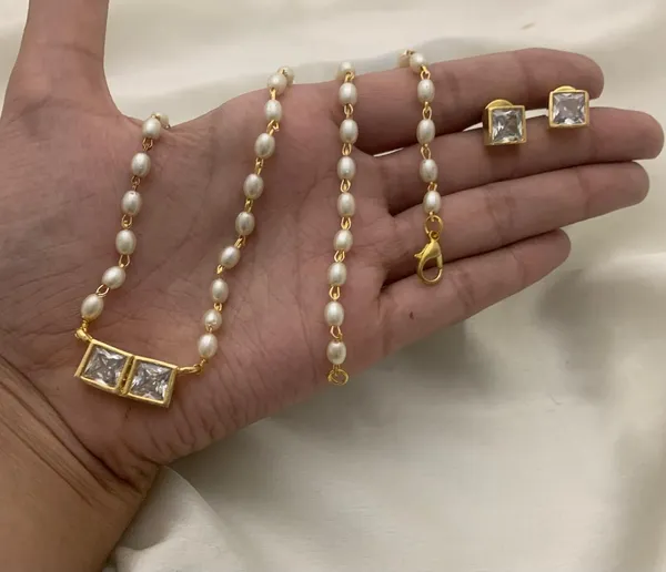 Trendy_Double_stone_Ad_pendant_with_single_line_Pearl_Mala_set