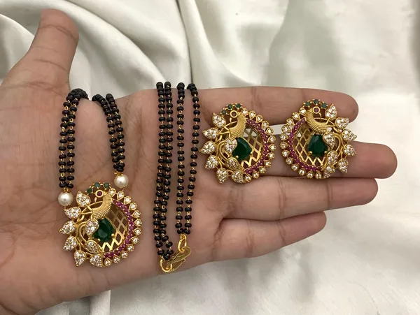 Elegant_Peacock_designed_Pendant_with_Earring_Mangalsutra_set