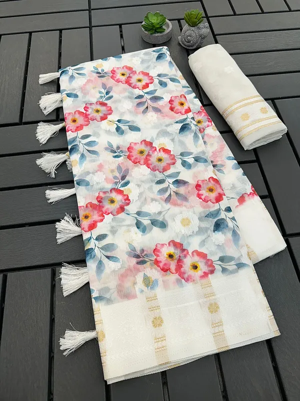 https://cdn-image.blitzshopdeck.in/ShopdeckCatalogue/tr:f-webp,w-600,fo-auto/63902d1f3379d893cc55a8bd/media/linen_flower_White2_TM_1717762541850_rin7ac1loy0m4fm.jpg__Royal Rajgharana Sarees