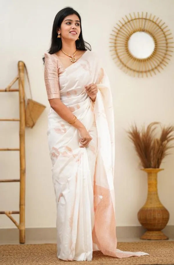 Staring_White_Soft_Silk_Saree_With_Breathtaking_Blouse_Piece