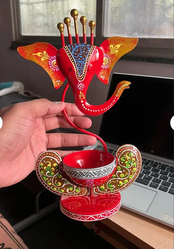 Metal_krishna_and_ganesha_Showpiece_Tea_Light_Holder_combo_(2Pc)