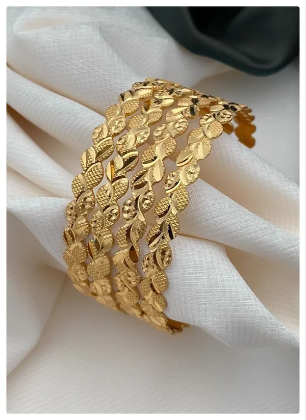 https://cdn-image.blitzshopdeck.in/ShopdeckCatalogue/tr:f-webp,w-600,fo-auto/6415958f1a426000122ef29a/media/AARNA_GOLD_PLATED_HANDCRAFTED_BANGLE_NXA9P7TH5B_2024-02-18_1.jpg__Aarna Jewel