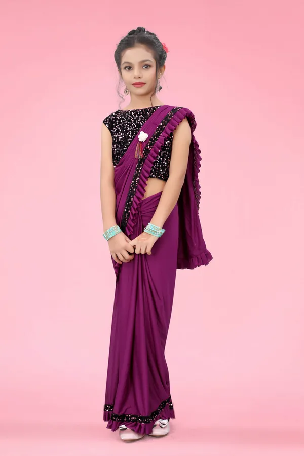 https://cdn-image.blitzshopdeck.in/ShopdeckCatalogue/tr:f-webp,w-600,fo-auto/643fd8c850b2ce0012038443/media/Kids-saree-Wine_1699610516961_c16stcw9rysex2f.jpg__Shrithi Fashion Fab