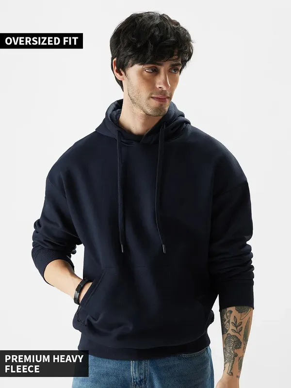 https://cdn-image.blitzshopdeck.in/ShopdeckCatalogue/tr:f-webp,w-600,fo-auto/646221e5b61dc20016b62659/media/Solid_Navy_Blue_Hoodie_1703150243975_31iwunfdpcc6sbj.jpg