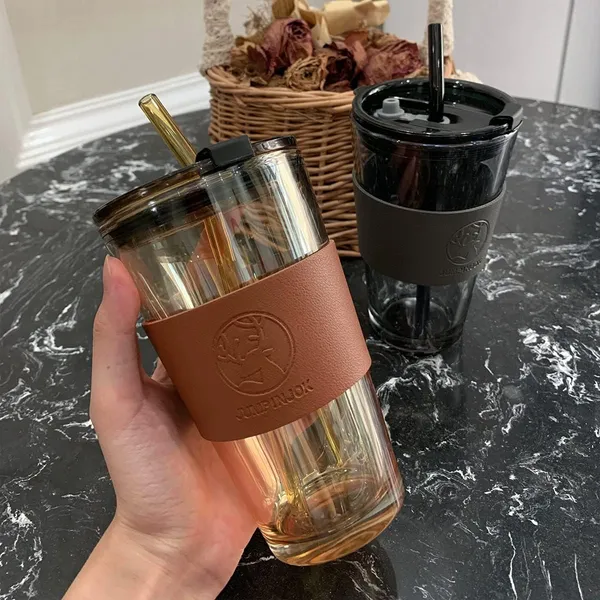 Glass_Tumblers_with_Straws_and_Lids,_Aesthetic_Coffee_Sipper_Mug_with_Leather_Sleeve,Glass_Drinking_Mason_for_Iced_Tea,_Juice,_Cocktail,_Cold_&_Hot_Beverages_Cups_Pack_of_1_(Golden)