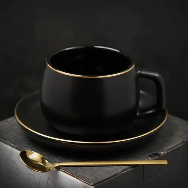 Gold_On_Black_Cup_And_Saucer_Set_(1_Cups_And_1_Saucers)