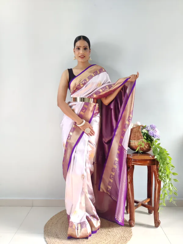 https://cdn-image.blitzshopdeck.in/ShopdeckCatalogue/tr:f-webp,w-600,fo-auto/64ca33f8cdd84800128e56ed/media/1_Min_In_Reddy_To_Wear_Kanjivaram_Soft_Litchi_Silk_Saree_7AIMRSY38C_2023-10-18_1.jpg__MMventure