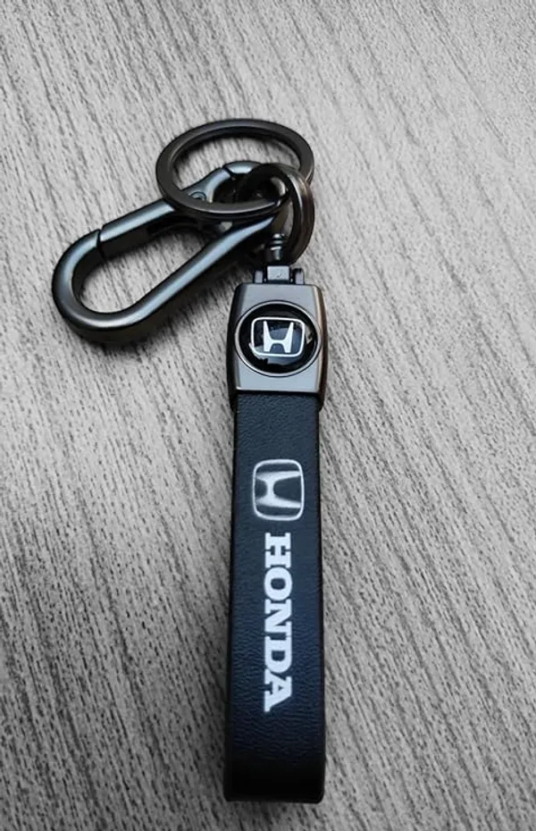 https://cdn-image.blitzshopdeck.in/ShopdeckCatalogue/tr:f-webp,w-600,fo-auto/64e31e1c279cee0014413fce/media/Leather_Keychain_Compatible_With_Honda_Car-_Make_Your_Car_Unique_with_This_Stylish_Key_Chain_UVJI07FRC1_2023-12-24_1.jpg__ MAYJAI - Automotive Accessories