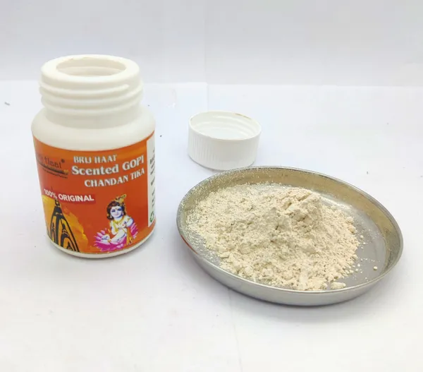 Natural_Gopi_Chandan_powder_tika_with_Plate_and_16_Types_Metal_tika_Stamp_Forehead_(Gopi.60g+16stp)