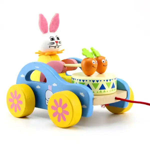 https://cdn-image.blitzshopdeck.in/ShopdeckCatalogue/tr:f-webp,w-600,fo-auto/65041cdcddcb53001273264b/media/Wooden_Rabbit_Pull_Along_Car_with_Drums_for_1__years_old_UDVS15LQKC_2023-12-09_1.webp__Tokid Toys