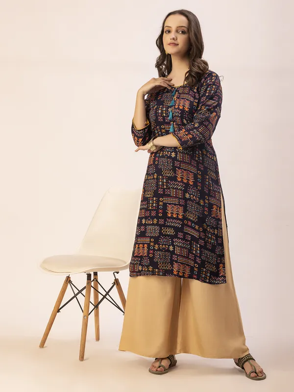 Navy_Blue_Rayon_Women_Kurta,__Tribal_Inspired_Foil_Print_with_Tassels