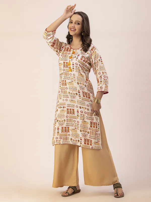 Off_White_Rayon_Women_Kurta,__Tribal_Inspired_Foil_Print_with_Tassels