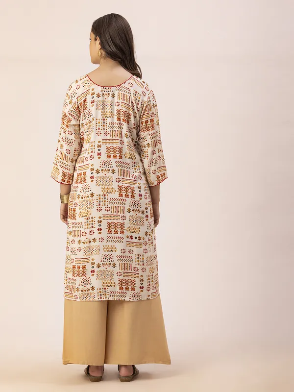 Off_White_Rayon_Women_Kurta,__Tribal_Inspired_Foil_Print_with_Tassels