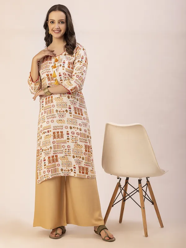 Off_White_Rayon_Women_Kurta,__Tribal_Inspired_Foil_Print_with_Tassels