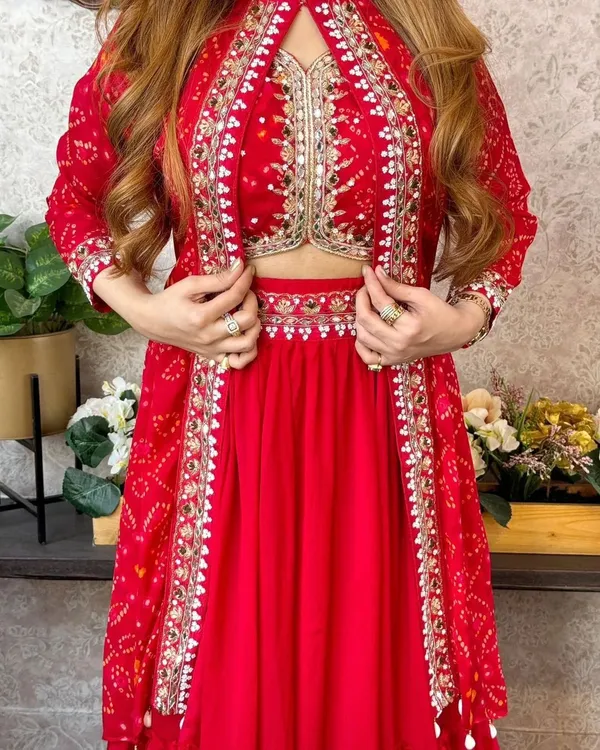 https://cdn-image.blitzshopdeck.in/ShopdeckCatalogue/tr:f-webp,w-600,fo-auto/6517c6ed452164001281fb64/media/New_Super_Trending_Party_Wear_Shrug_lahenga_K7EN676WSJ_2024-04-15_1.jpeg__HILAG TRENDZ