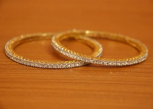 Sanvi Jewels Solitaire Look Gold Plated Single Line Bangles For Women Price in India Buy Sanvi Jewels Solitaire Look Gold Plated Single Line Bangles