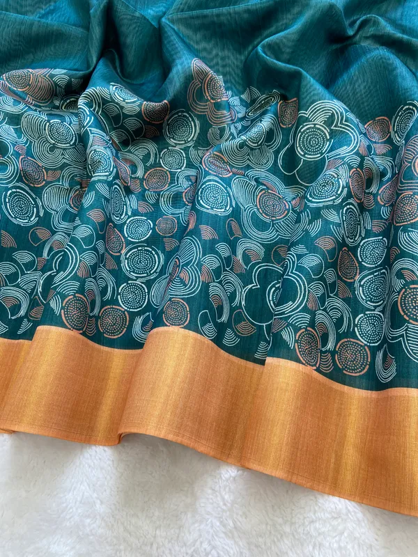 Soft_Tussar_Silk_sarees_with_Beautiful_Print_With_Attractive_Border_And_Contrast_Print_Blouse_With_Tassels