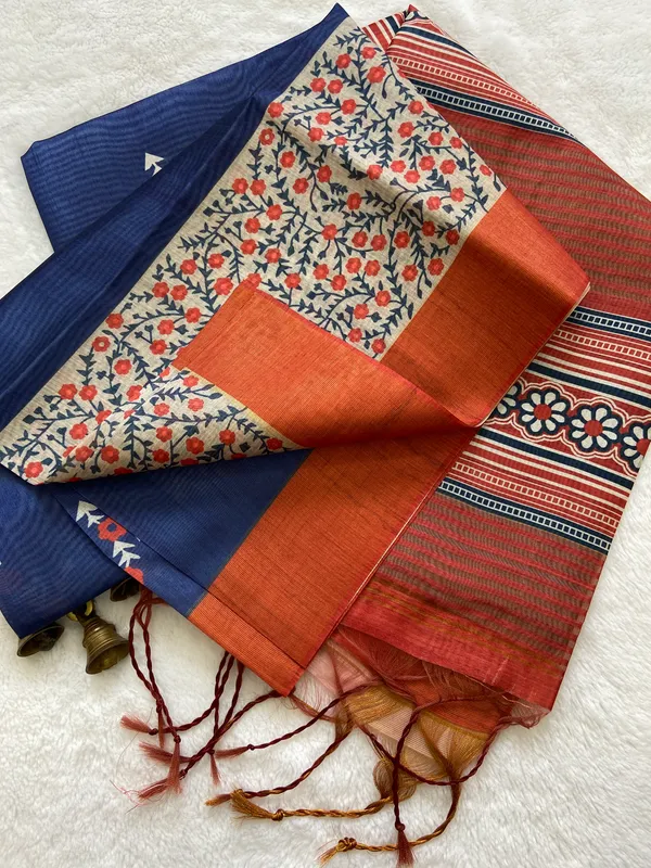 Jivika_Orange_&_Blue_–_Diwali_Special_|_Soft_Tussar_Silk_Saree_with_Print,_Border_&_Contrast_Print_Blouse_with_Tassels