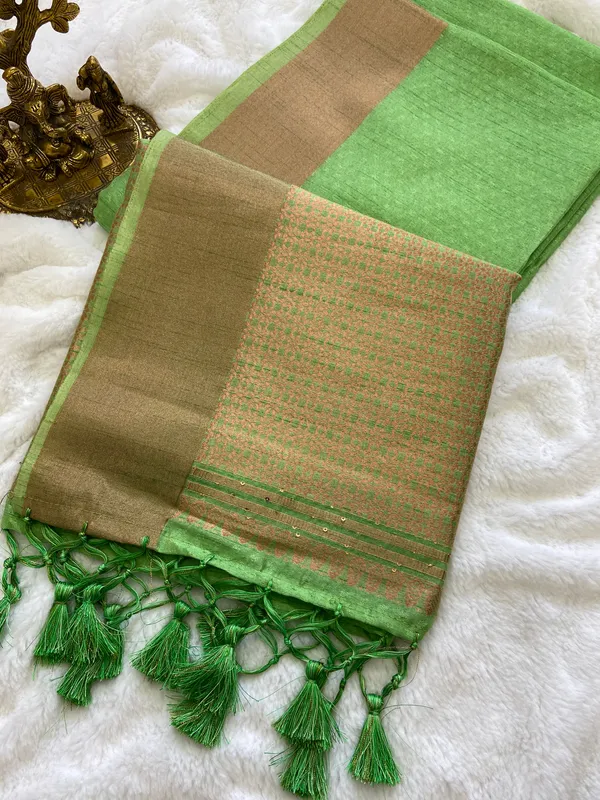 Veda_Green_–_Sacred_Wedding_Special_|_Soft_Banarasi_Silk_Saree_with_Pallu_Sequence_Work,_Gold_Border_&_Running_Blouse_with_Tassels