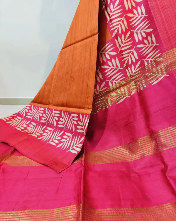 Soft_Tussar_Silk_sarees_(Pink-Orange)_with_Beautiful_Print_With_Attractive_Border_And_Contrast_Print_Blouse_With_Tassels_in_new_styles