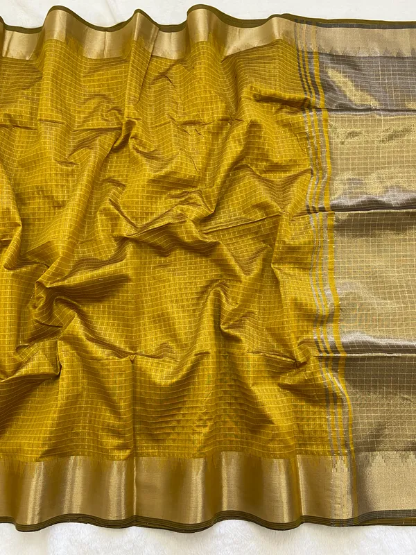 Sanavi_Yellow_–_Temple_Border_Wedding_Special_|_Maheshwari_Handloom_Zari_Checks_Silk_Saree_with_Zari_Weaving_&_Sequence_Work_Pallu,_Gold_Temple_Border