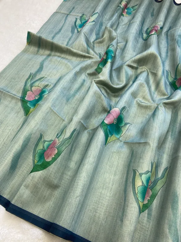 Madhuri_Blue_&_Sky_Blue_–_Sweet_Festive_Season_Special_|_Soft_Tussar_Silk_Saree_with_Print,_Pallu_&_Contrast_Print_Blouse_with_Tassels