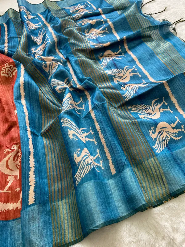 Saloni_Blue_–_Navratri_Special_|_Soft_Tussar_Silk_Saree_with_Print,_Pallu_&_Contrast_Print_Blouse_with_Tassels
