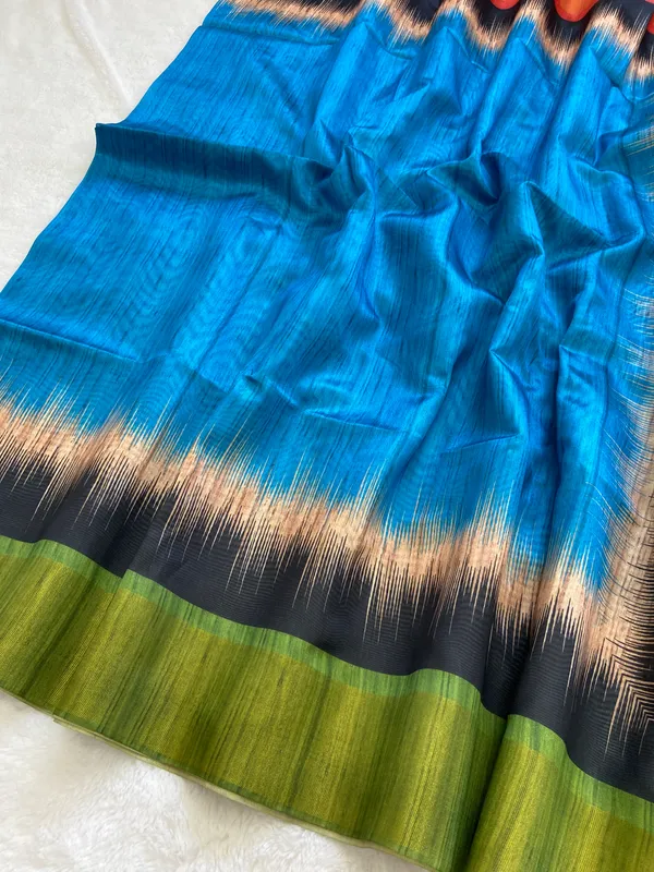 Mihika_Sky_Blue_–_Dew_Fresh_Navratri_Special_|_Soft_Tussar_Silk_Saree_with_Print,_Pallu_&_Contrast_Print_Blouse_with_Tassels