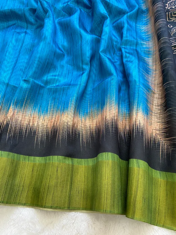 Mihika_Sky_Blue_–_Dew_Fresh_Navratri_Special_|_Soft_Tussar_Silk_Saree_with_Print,_Pallu_&_Contrast_Print_Blouse_with_Tassels
