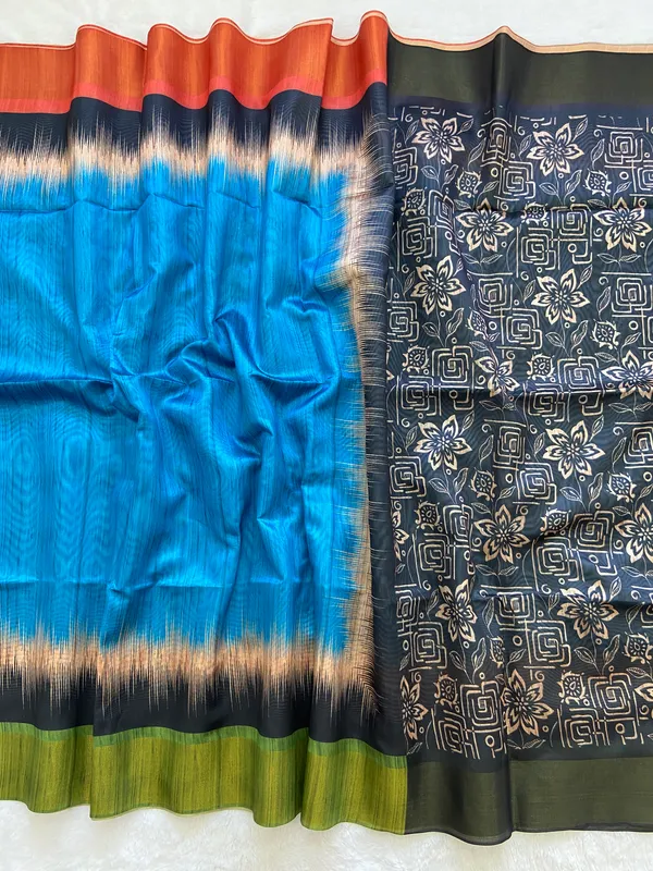 Mihika_Sky_Blue_–_Dew_Fresh_Navratri_Special_|_Soft_Tussar_Silk_Saree_with_Print,_Pallu_&_Contrast_Print_Blouse_with_Tassels