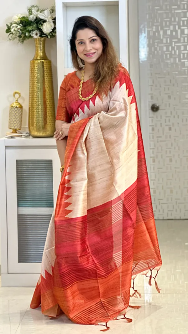 Temple_Tussar_2_Orange_&_Pink_–_Temple_Border_Diwali_Special_|_Soft_Tussar_Silk_Saree_with_Print,_Temple_Border_&_Contrast_Print_Blouse_with_Tassels