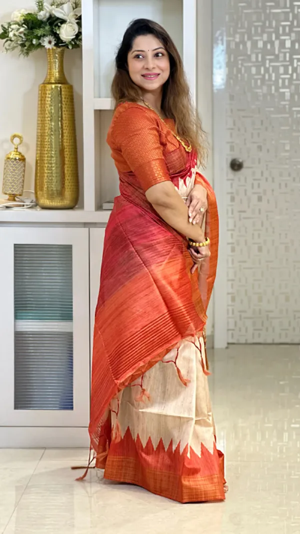 Temple_Tussar_2_Orange_&_Pink_–_Temple_Border_Diwali_Special_|_Soft_Tussar_Silk_Saree_with_Print,_Temple_Border_&_Contrast_Print_Blouse_with_Tassels