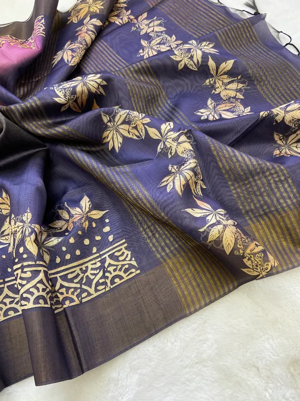 Lakshmi_Blue_–_Auspicious_Diwali_Special_|_Soft_Tussar_Silk_Saree_with_Print,_Border_&_Contrast_Print_Blouse_with_Tassels