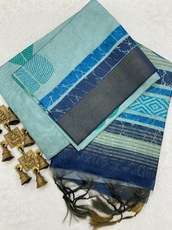 Hiral_Sky_Blue_–_Diamond_Navratri_Special_|_Soft_Tussar_Silk_Saree_with_Print,_Border_&_Contrast_Print_Blouse_with_Tassels