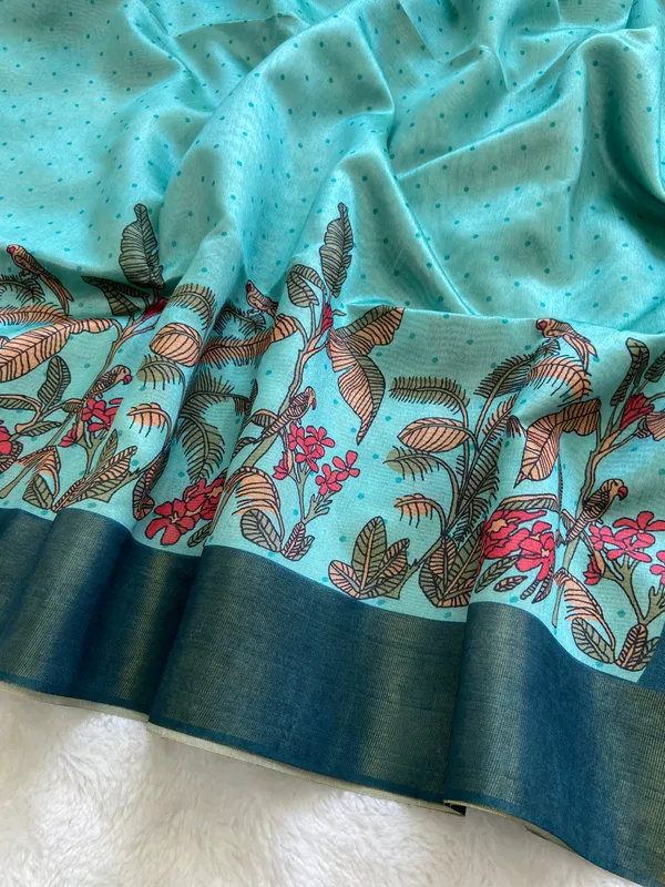 Jiya_Blue_&_Sky_Blue_–_Heartfelt_Festive_Season_Special_|_Soft_Tussar_Silk_Saree_with_Print,_Border_&_Contrast_Print_Blouse_with_Tassels