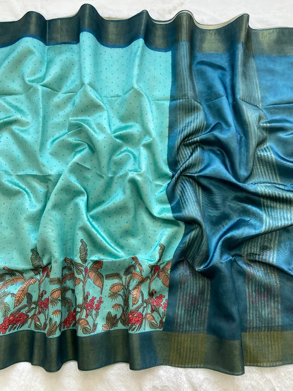 Jiya_Blue_&_Sky_Blue_–_Heartfelt_Festive_Season_Special_|_Soft_Tussar_Silk_Saree_with_Print,_Border_&_Contrast_Print_Blouse_with_Tassels