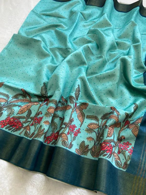 Jiya_Blue_&_Sky_Blue_–_Heartfelt_Festive_Season_Special_|_Soft_Tussar_Silk_Saree_with_Print,_Border_&_Contrast_Print_Blouse_with_Tassels