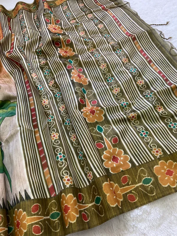 Moksha_Mehendi_Green_–_Navratri_Special_|_Soft_Tussar_Silk_Saree_with_Print,_Pallu_&_Contrast_Print_Blouse_with_Tassels