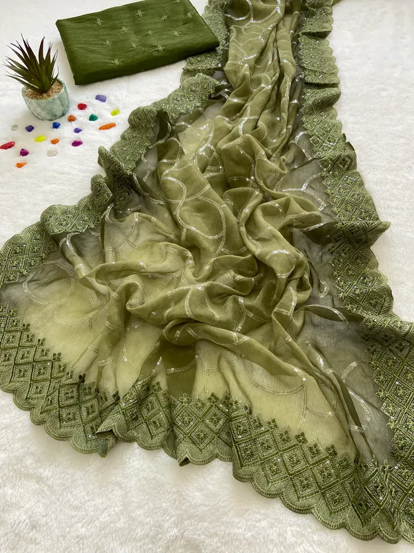 Amiya_Green_No.3_–_Nectar_Diwali_Special_|_Shimmer_Sitara_Pending_Fabric_Saree_with_Embroidery_&_Sequence_Work,_Cutwork_Border_&_Heavy_Embroidery