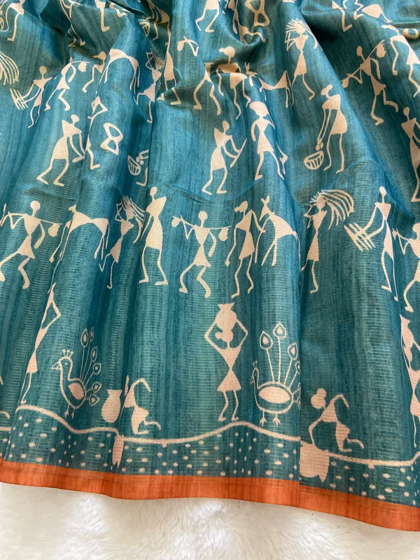 Ojasvi_Orange_–_Radiant_Diwali_Special_|_Soft_Tussar_Silk_Saree_with_Print,_Pallu_&_Contrast_Print_Blouse_with_Tassels