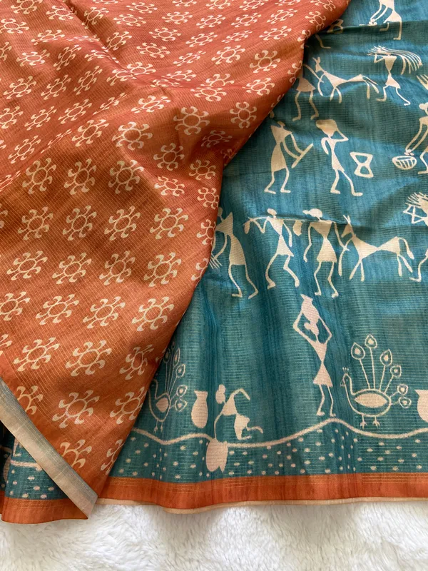 Ojasvi_Orange_–_Radiant_Diwali_Special_|_Soft_Tussar_Silk_Saree_with_Print,_Pallu_&_Contrast_Print_Blouse_with_Tassels
