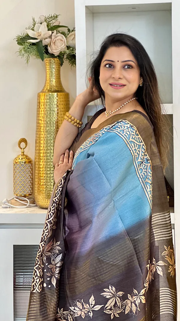 Lakshmi_Grey_–_Auspicious_Diwali_Special_|_Soft_Tussar_Silk_Saree_with_Print,_Border_&_Contrast_Print_Blouse_with_Tassels