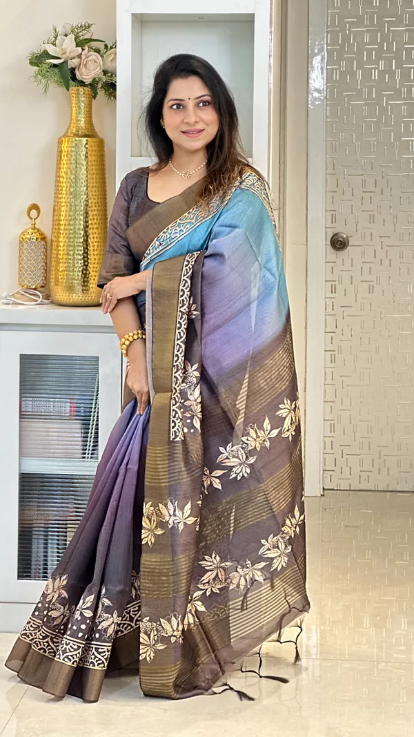 Lakshmi_Grey_–_Auspicious_Diwali_Special_|_Soft_Tussar_Silk_Saree_with_Print,_Border_&_Contrast_Print_Blouse_with_Tassels