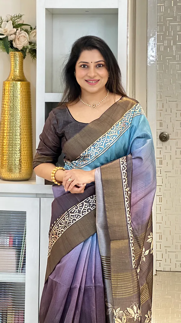 Lakshmi_Grey_–_Auspicious_Diwali_Special_|_Soft_Tussar_Silk_Saree_with_Print,_Border_&_Contrast_Print_Blouse_with_Tassels