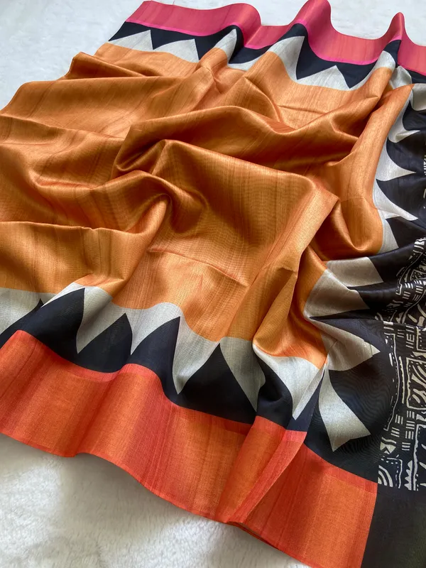 Anjali_Orange_No.1_–_Devotional_Diwali_Special_|_Soft_Tussar_Silk_Saree_with_Print,_Border_&_Contrast_Print_Blouse_with_Tassels