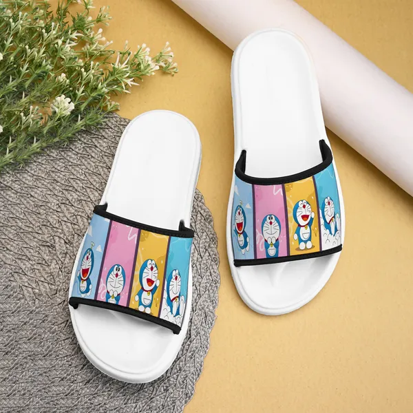 https://cdn-image.blitzshopdeck.in/ShopdeckCatalogue/tr:f-webp,w-600,fo-auto/65210b27860769bab53de0ef/media/Doraemon_Multicolor_White_Women_Slide_Slippers_3LJR9OO2UP_2024-03-29_1.jpg__Dicy footwear