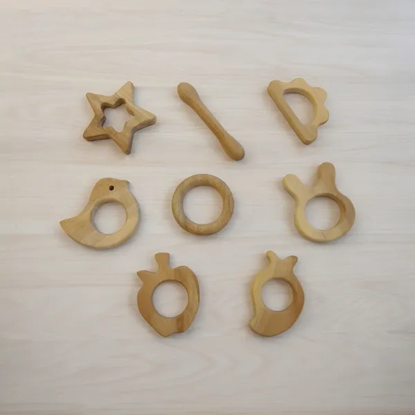 Pack_of_8_Pure_Neem_Wooden_Teethers_-_Smooth_Finishing_with_Round_Edges-Natural_Shapes_100%_Safe_&_Healthy