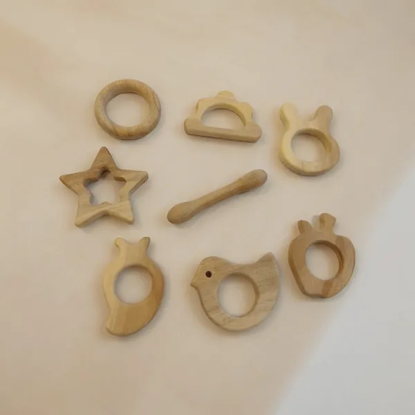 Pack_of_8_Pure_Neem_Wooden_Teethers_-_Smooth_Finishing_with_Round_Edges-Natural_Shapes_100%_Safe_&_Healthy