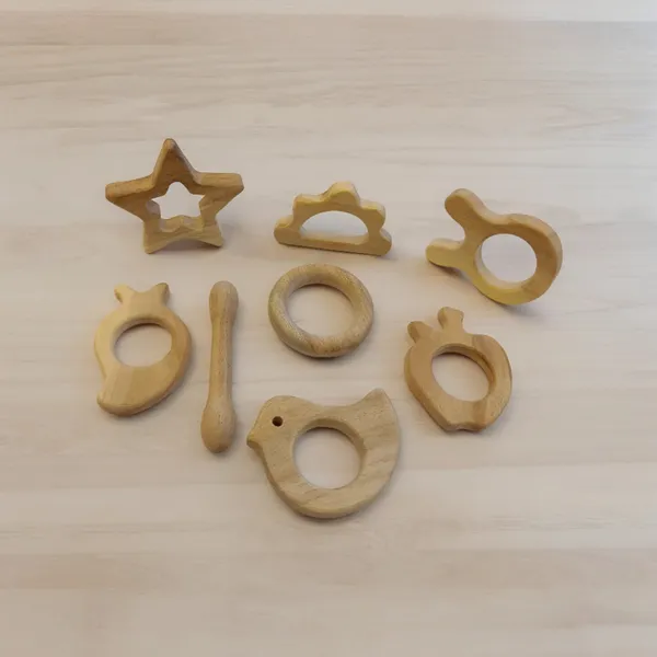 Pack_of_8_Pure_Neem_Wooden_Teethers_-_Smooth_Finishing_with_Round_Edges-Natural_Shapes_100%_Safe_&_Healthy