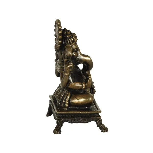 Decor_Copper_Handmade_Small_Ganesha_2.4_inches_Sitting_Idol_Statue_Showpiece_for_Home_Temple_Decor_II_Car_Dashboard_Decor_II_Office_Desk_II_Nice_Gift_Ideal_for_Good_Luck_Wishes_II